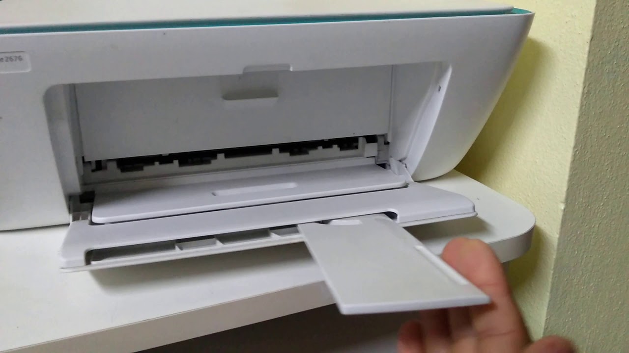 Desligar a impressora
Abrir todas as tampas e gavetas da impressora