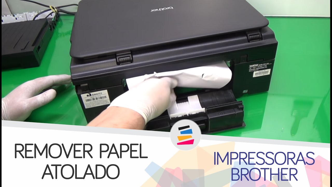 Remover qualquer papel preso ou dobrado com cuidado
Recolocar a bandeja de papel corretamente na impressora